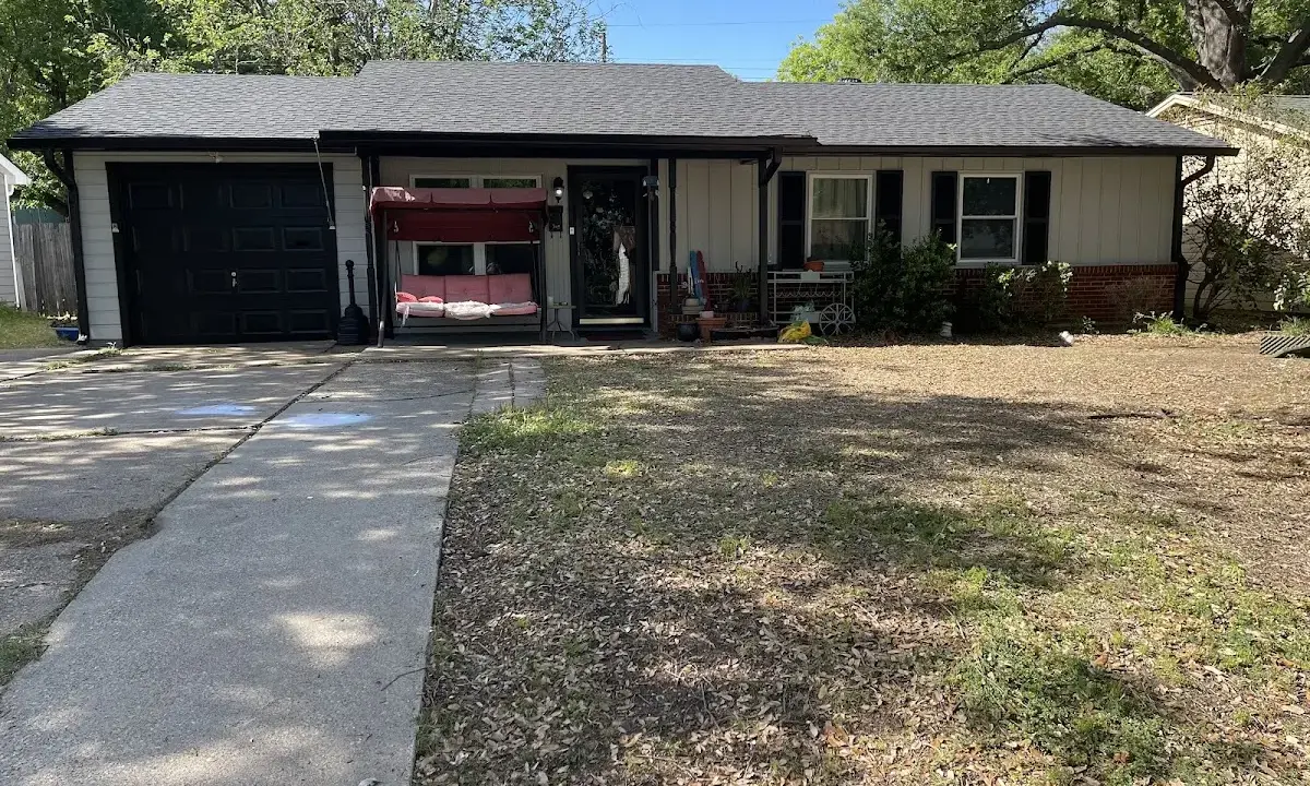 Asphalt Shingle Roof Repair crew at work on a residential roof in Lockhart
